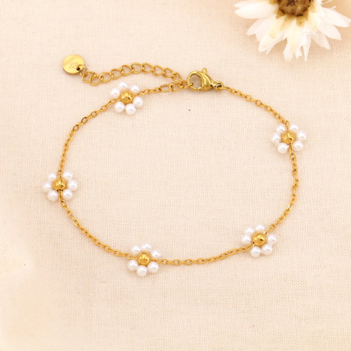 Bracelet acier inoxydable fleurs billes imitation perle 0224102 blanc Bracelet acier inoxydable fleurs billes imitation perle 0224102 blanc