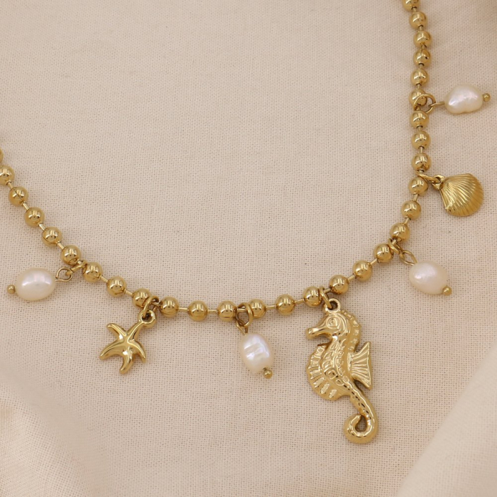 Collier acier hippocampe astérie coquillage perle 0125038 doré