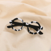 Broche fantaisie en forme de lunettes résine et métal 0525018 noir/blanc