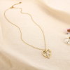 Collier en acier inoxydable cœur visage 0125133 doré