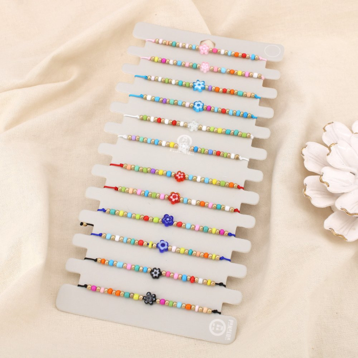 Lot de 12 bracelets fantaisie coulissants Perles rocaille multicolores 0225204 multi Lot de 12 bracelets fantaisie coulissants Perles rocaille multicolores 0225204 multi