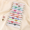Lot de 12 bracelets élastiques fantaisie cœur émail 0225209 multi