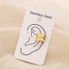 2 Bijoux d'oreilles acier inoxydable ajouré goutte 0325099 doré 2 Bijoux d'oreilles acier inoxydable ajouré goutte 0325099 doré