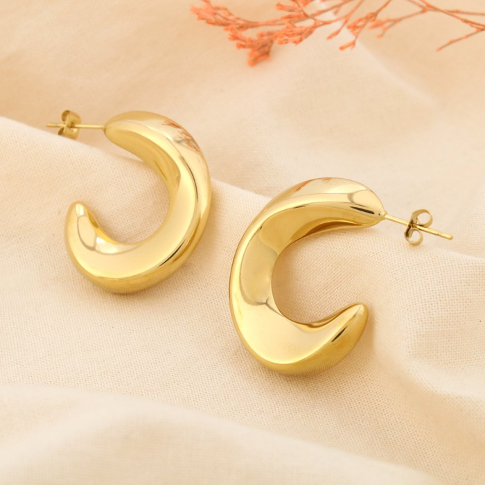 Boucles d’oreilles demi-créoles acier sculptural 0325574 doré Boucles d’oreilles demi-créoles acier sculptural 0325574 doré