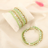 12 bracelets élastiques cristal facetté vert perles nacrées 0226119 vert