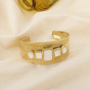 Bracelet manchette ouverte acier inoxydable cabochons nacre naturelle 0226102 blanc