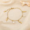 Bracelet acier inoxydable poisson perle acrylique 0226231 doré