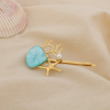 Barrette cheveux acier inoxydable coquillage cabochon résine algues 0625107 bleu turquoise